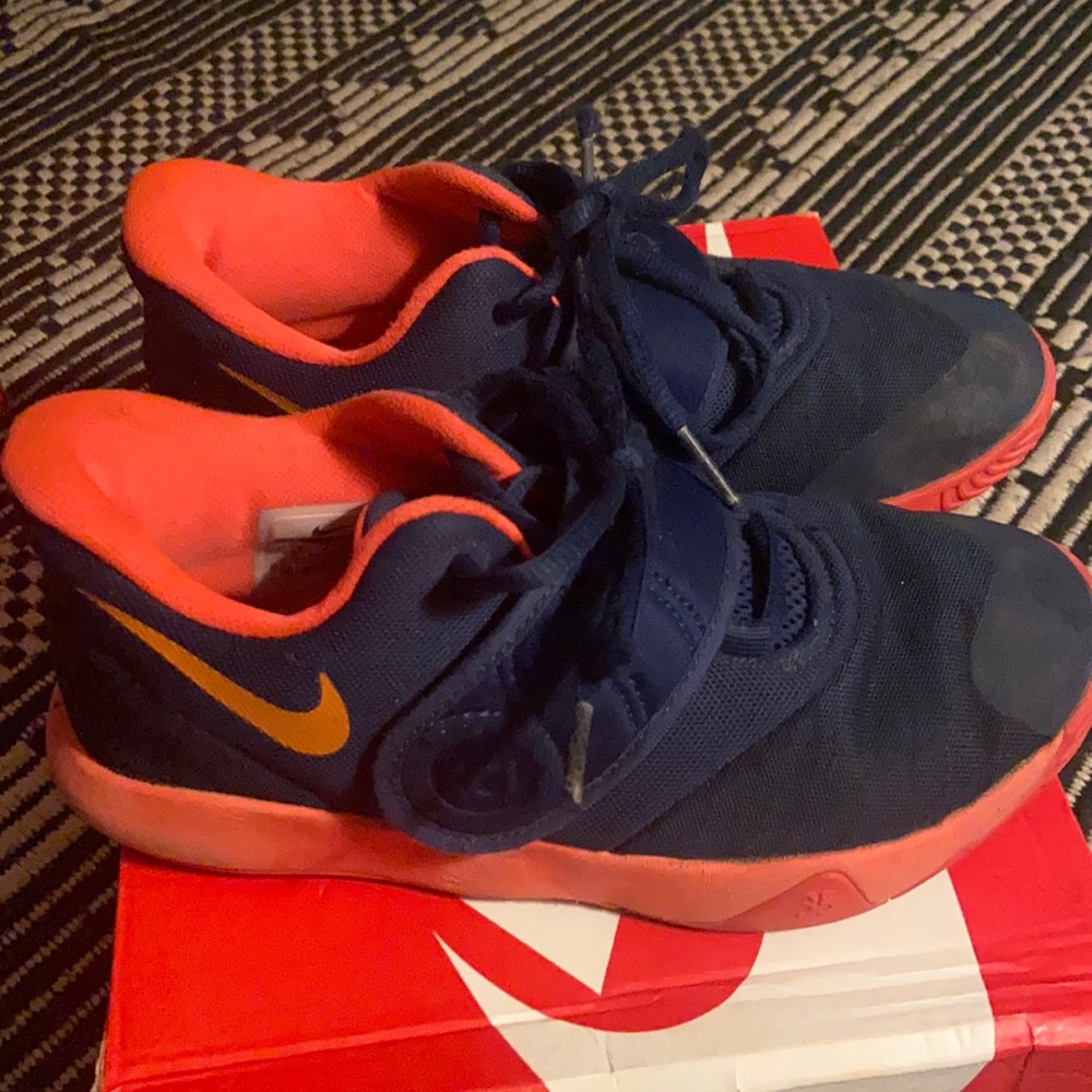 Kids Nike shoes, size 2& half prefect for some color to your style.